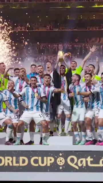 A short of Lionel Messi lifting the World Cup with Argentina