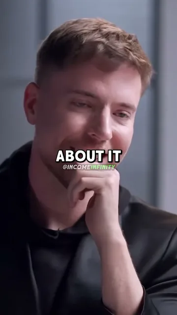 A Diary of a CEO short of MrBeast smiling as he listens